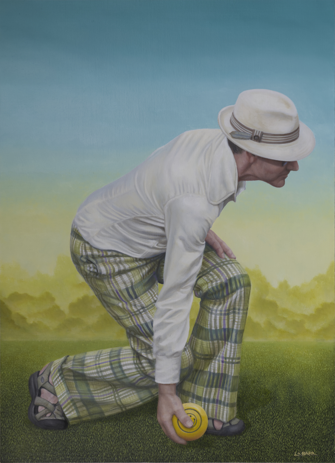 Portrait of man lawn bowling.